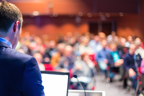 Speaker-at-Business-Conference-68264065